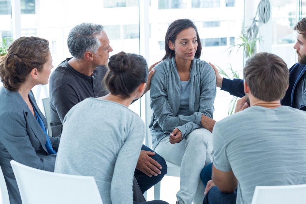 woman-comforted-during-long-term-rehab