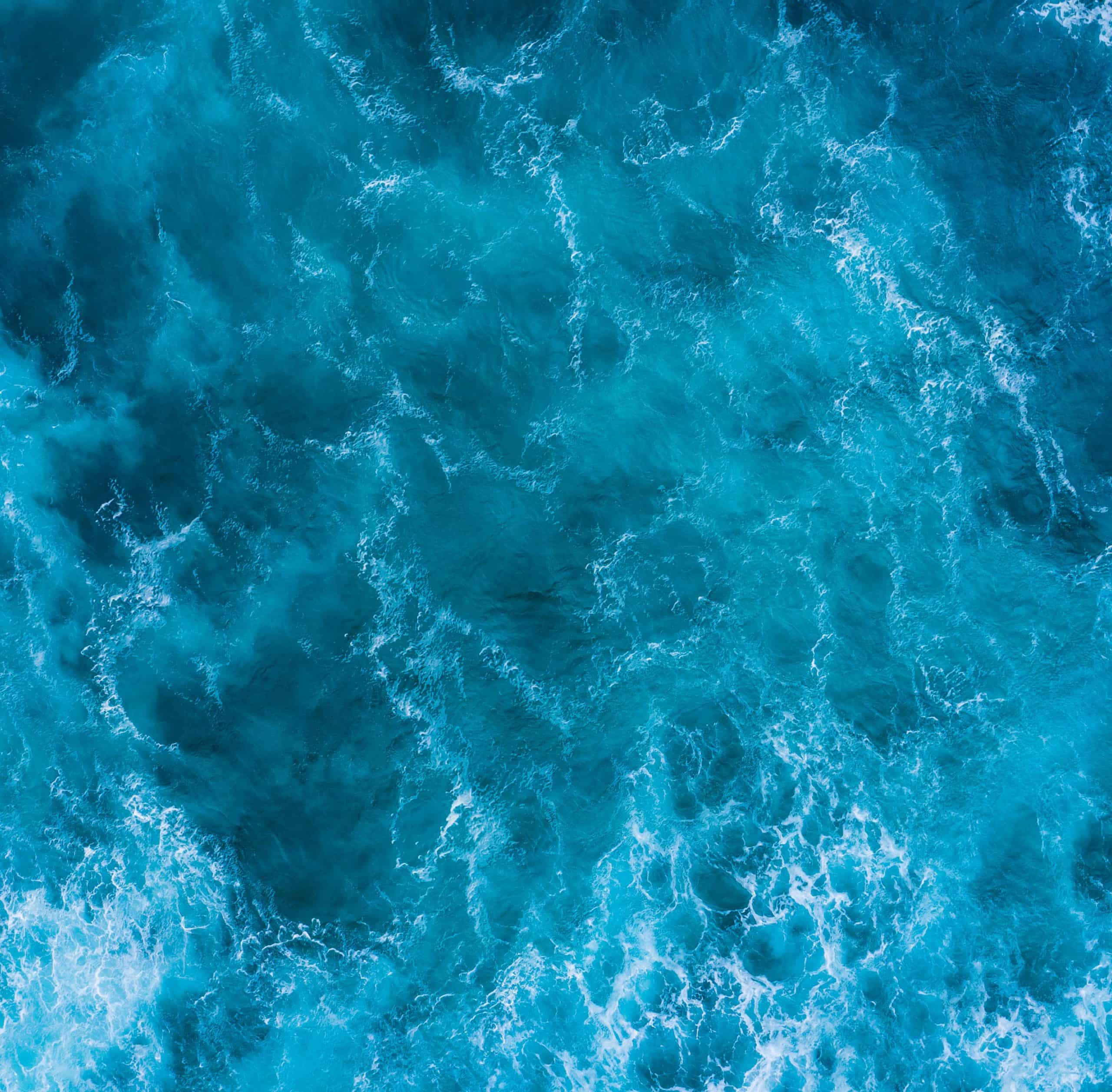 Background image of ocean waves representing West Palm Beach rehab location.
